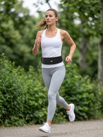 Ceinture de course avec poche gourde et bande réfléchissante
